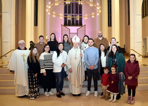 The Easter Vigil celebrated at the Cathedral of St. Mary and St. Anne, Cork, with principal celebrant Bishop Fintan Gavin, included the initiation in to the Catholic Church of two people who have come to Cork from Brazil. Edina Teopoldo de Campos (to theleft of Bishop Fintan) and Danilo Fraga Peixoto ( to the right of the bishop) are pictured with families and friends after they were baptised and confrimed at the Easter Vigil. (Photo: Mike English).
